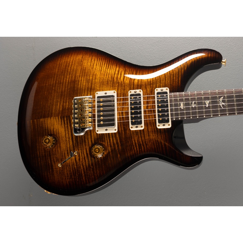 Studio 10 Top – Black Gold Wraparound Burst